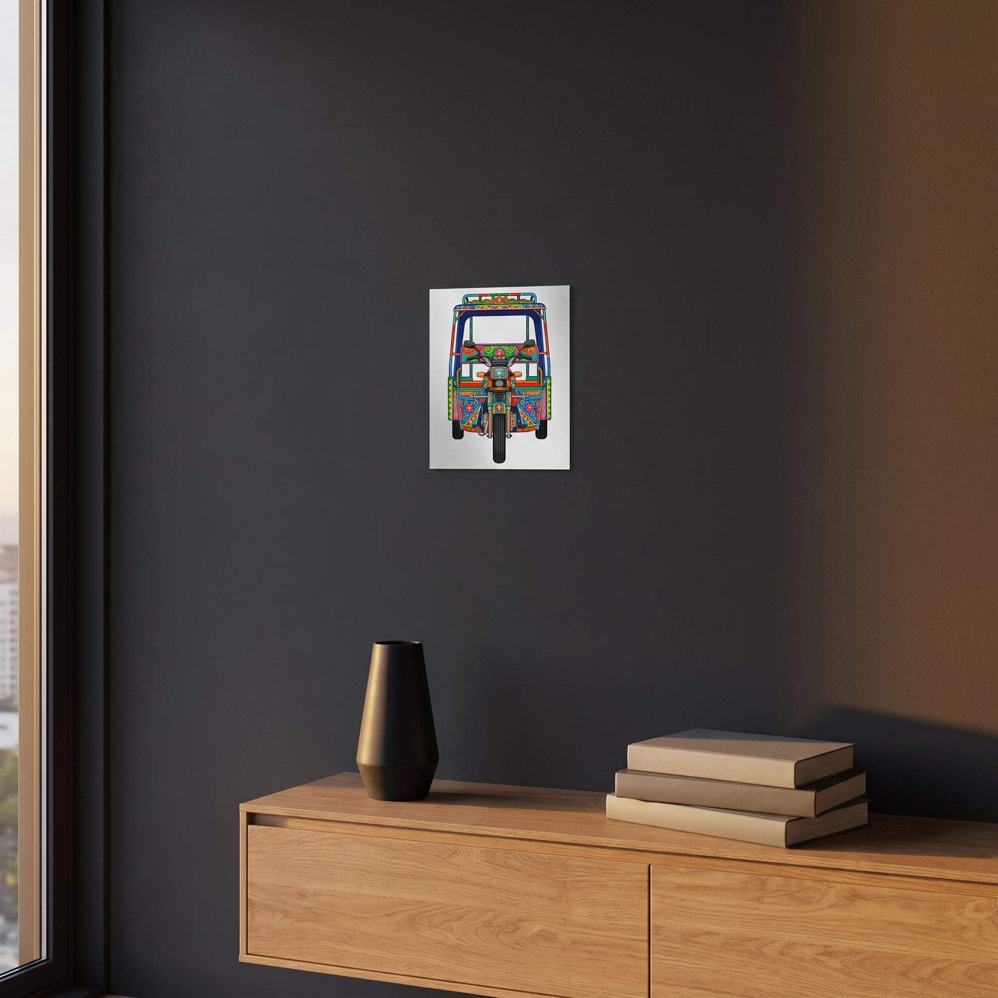 Traditional style South Asian vehicle illustration print displayed on a dark charcoal grey accent wall over a sleek wooden console floating cabinet.
