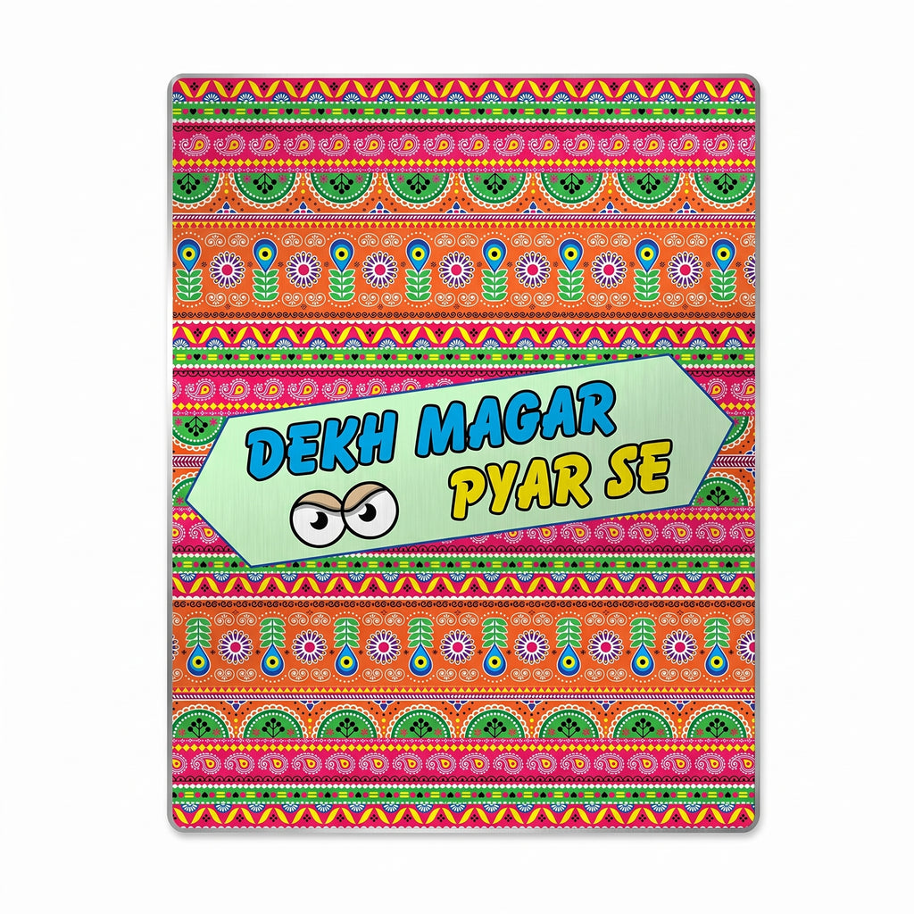 Close-up of Dekh Magar Pyar Se truck art metal print focusing on the light teal arrow banner, cartoon eyes, and orange paisley patterns.