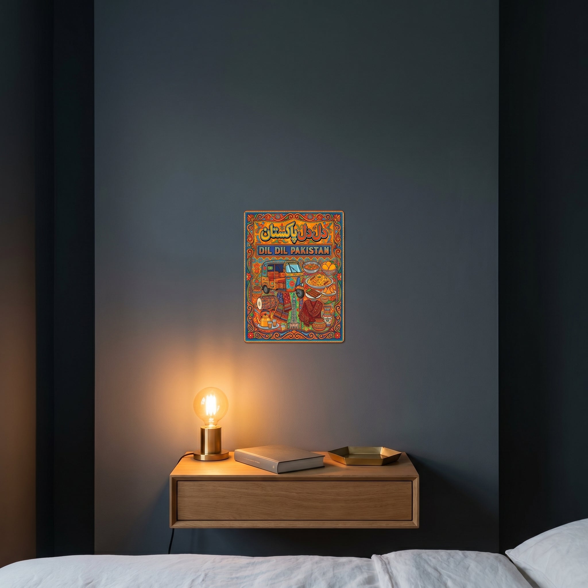 "Colorful Urdu slogan art print catching warm ambient light from a lamp above a contemporary bedroom nightstand setup."