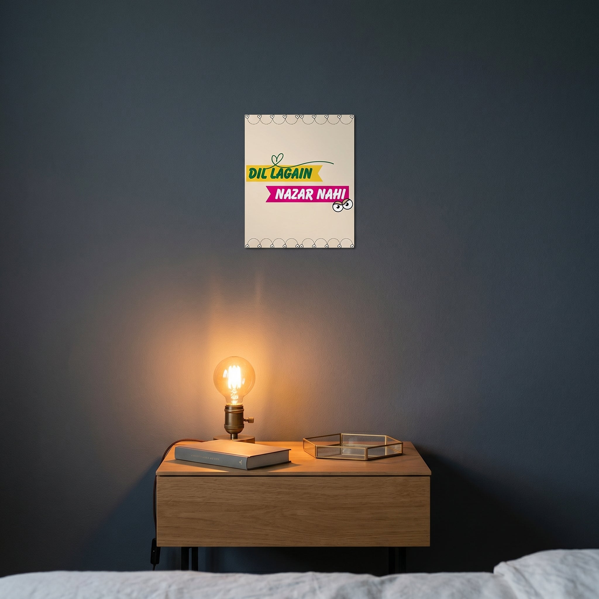 Contemporary bedroom nightstand setup featuring the framed truck art slogan poster catching warm ambient light from a lamp.
