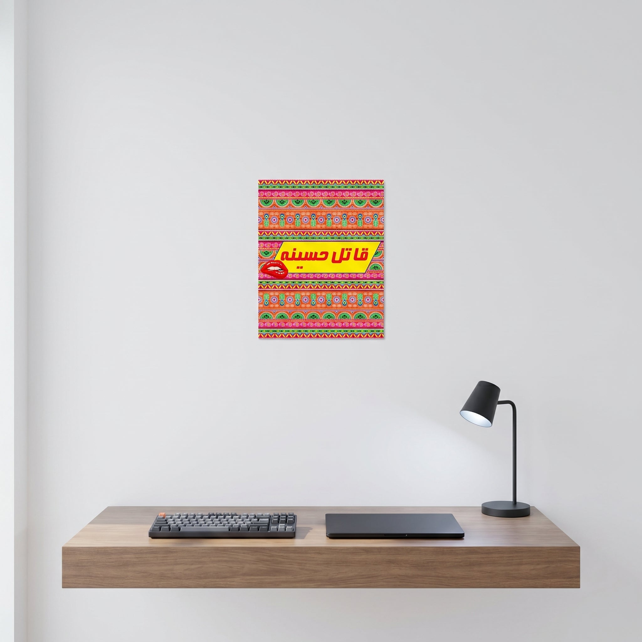Funny Desi slogan aluminum wall art displayed on a crisp white wall behind a minimalist home office desk workspace setup.