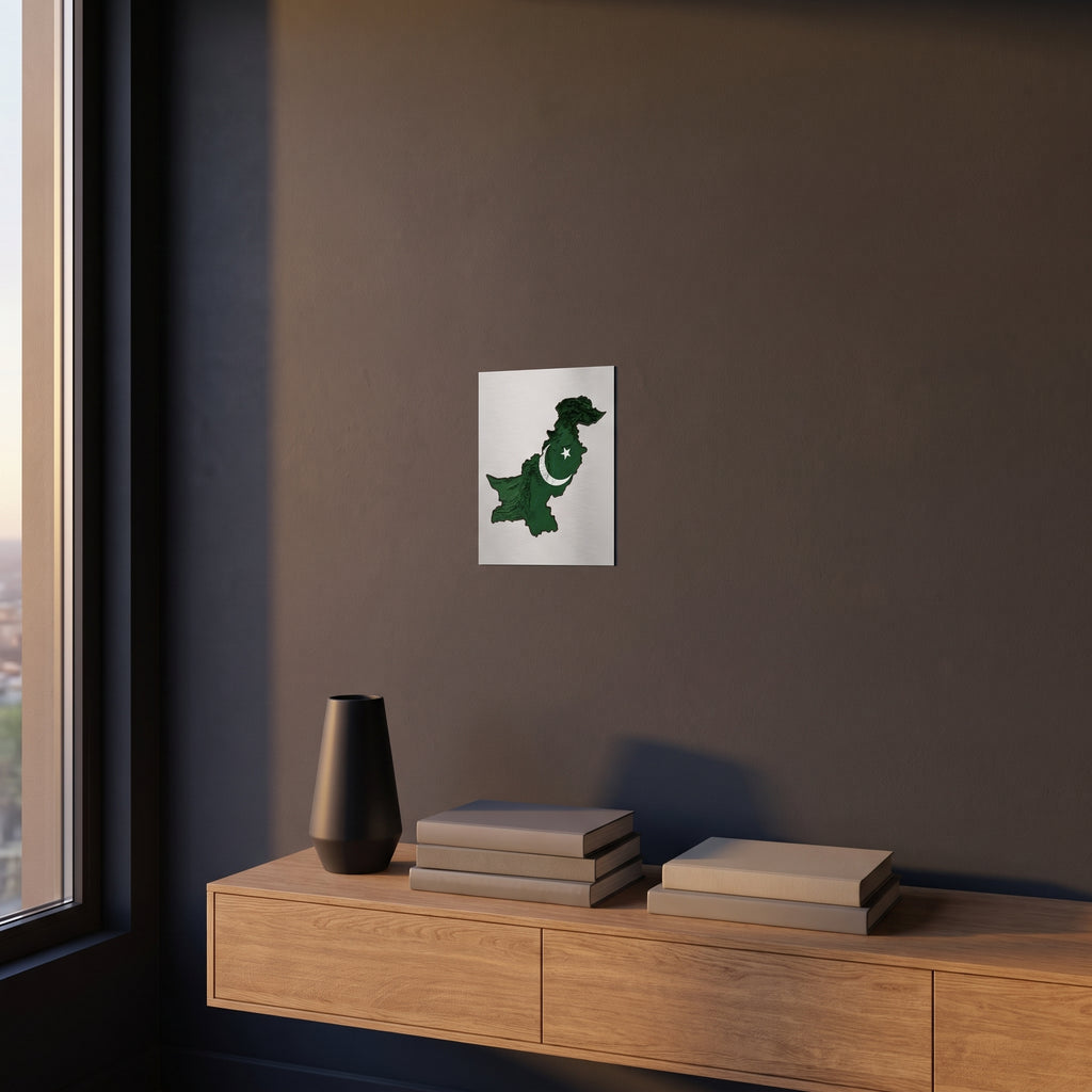 Modern 3D terrain map of Pakistan print displayed on a dark charcoal grey accent wall over a sleek wooden console floating cabinet.