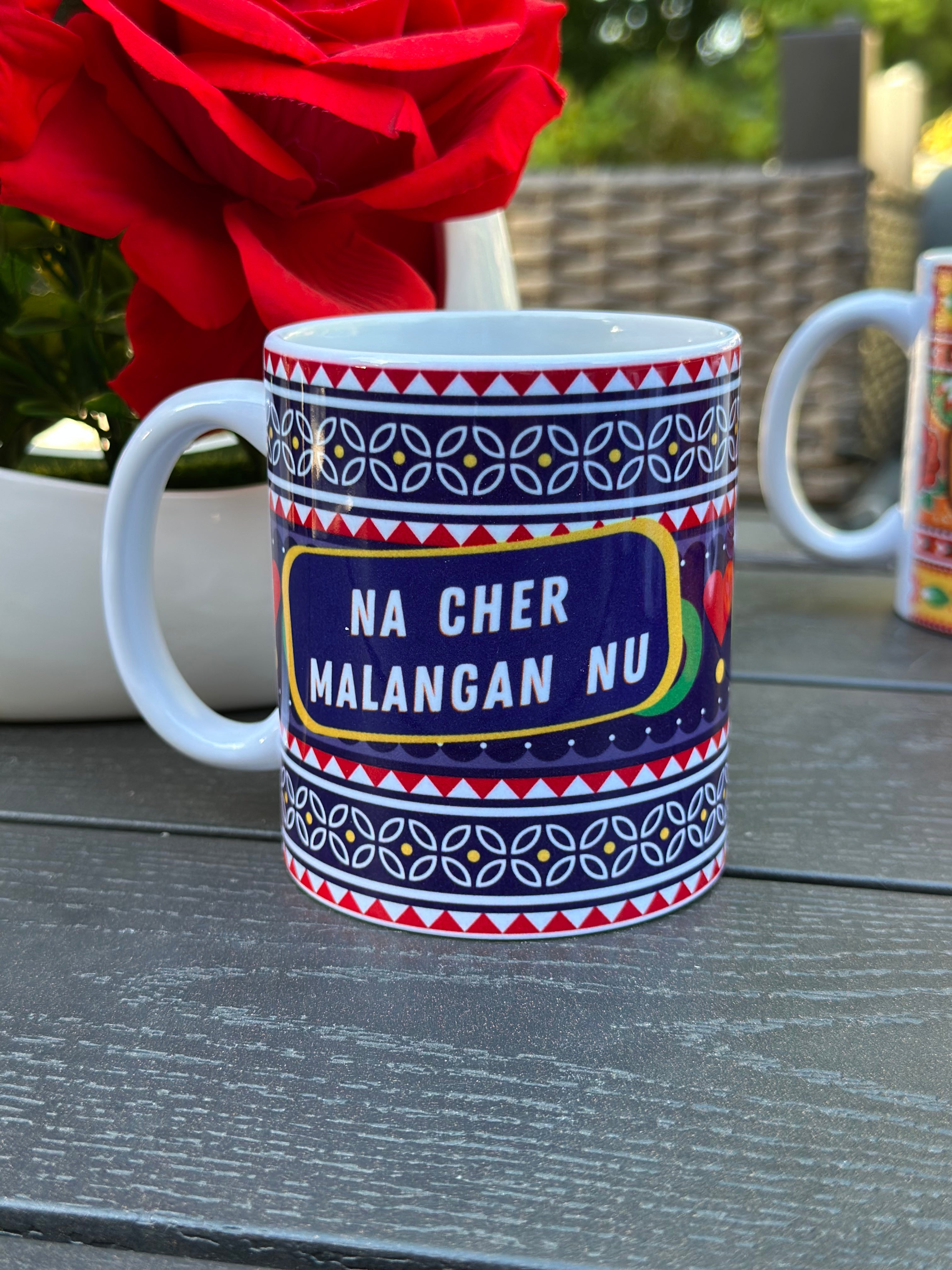 Na Cher Malangan Nu ceramic mug 11oz with bold funny desi quote design.
Perfect for chai and coffee lovers who enjoy humor and cultural vibes.
Durable ceramic with scratch-resistant vibrant print for daily use.
Microwave safe and dishwasher safe for convenience and easy cleaning.
Large comfortable handle makes sipping at home, work, or college easy.
Fun quirky gift for friends, family, or coworkers with desi humor.
Adds laughter, culture, and bold attitude to every chai or coffee break.