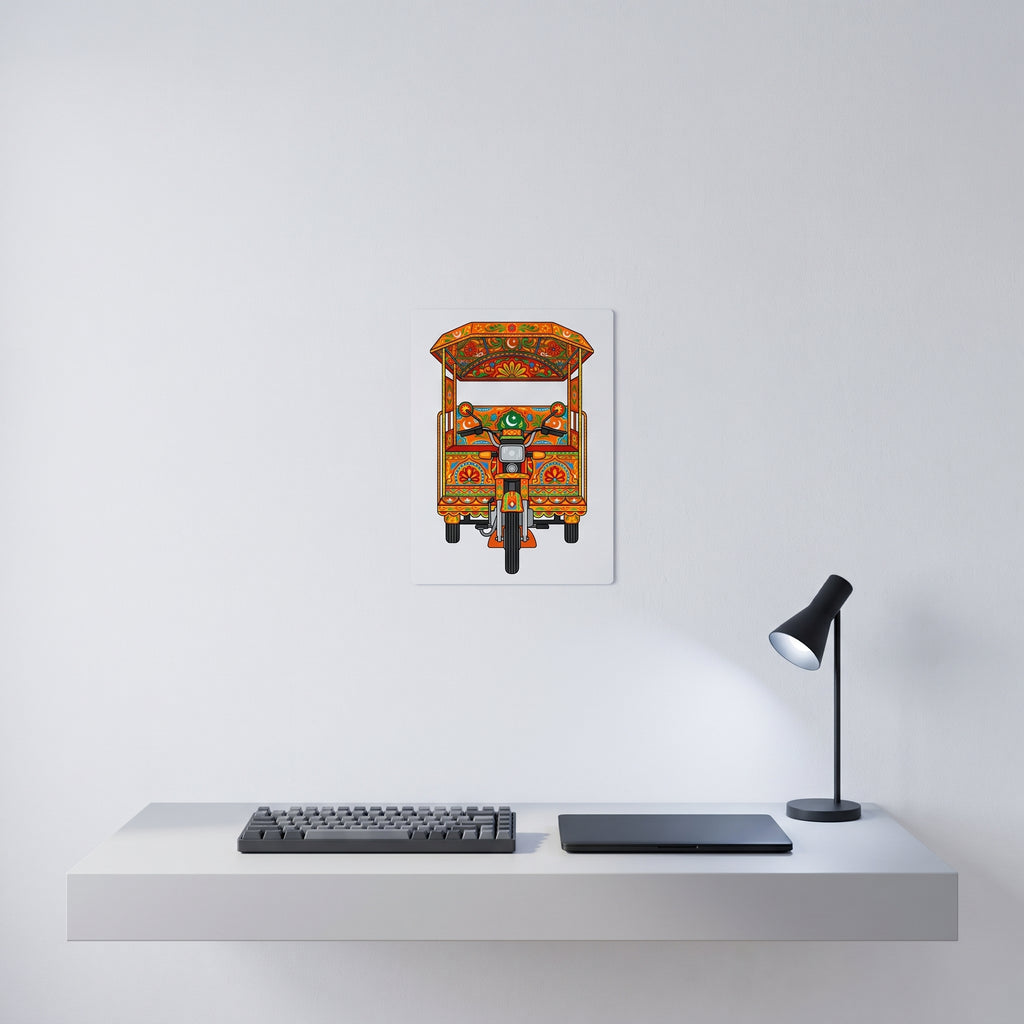 Vibrant Pakistani folk art statement sign styled on a crisp white wall behind a minimalist home office desk setup with a keyboard.
