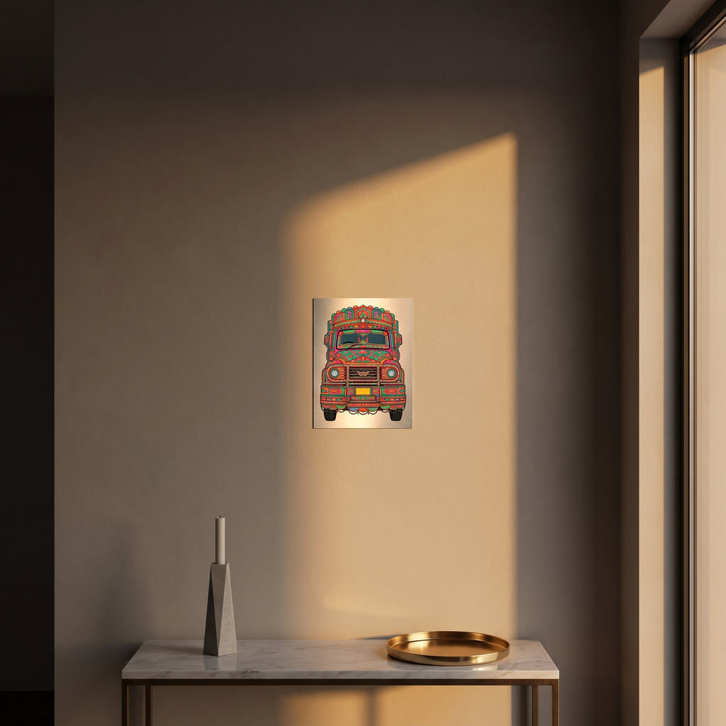 Pakistani truck art metal poster styled on a modern wooden console table catching dramatic afternoon window sunlight.
