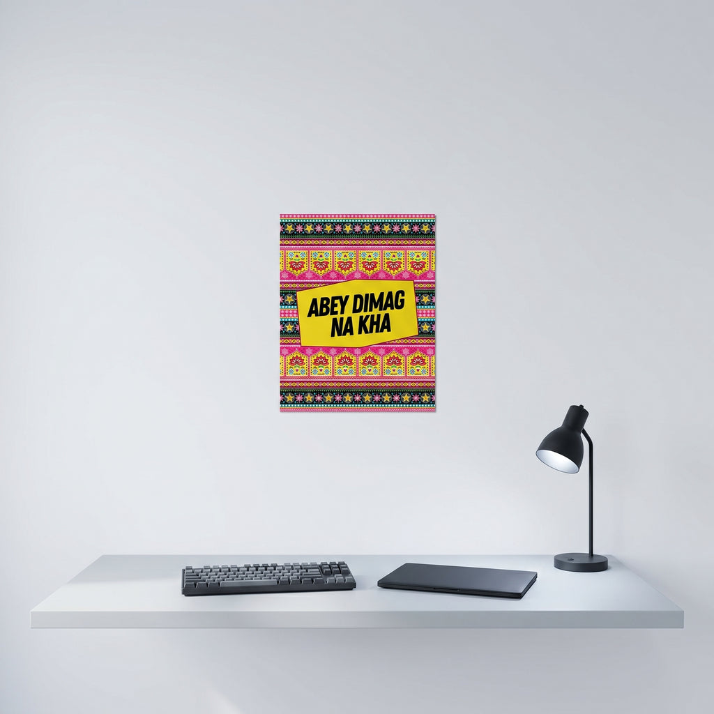 Vibrant Desi culture poster hanging elegantly on a crisp white wall behind a modern minimalist home office desk setup.
